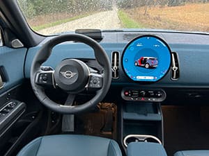 Inside the new MINI, there’s a round centre-mounted nav screen – borrowing the idea of the round speedometer in the centre of the original Mini.